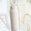 2-in-1 Thermos-juomapullo magneettisella puhelinpidikkeellä - Valkoinen